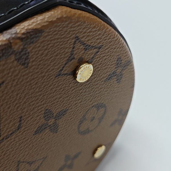 CANNES PM Monogram Coated Canvas Brown