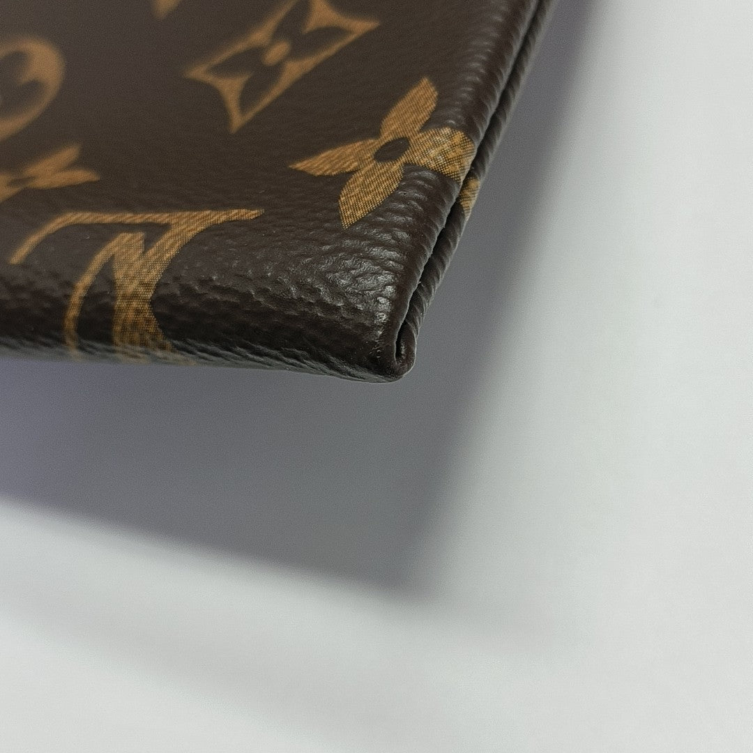 DISCOVERY Monogram Coated Canvas Brown