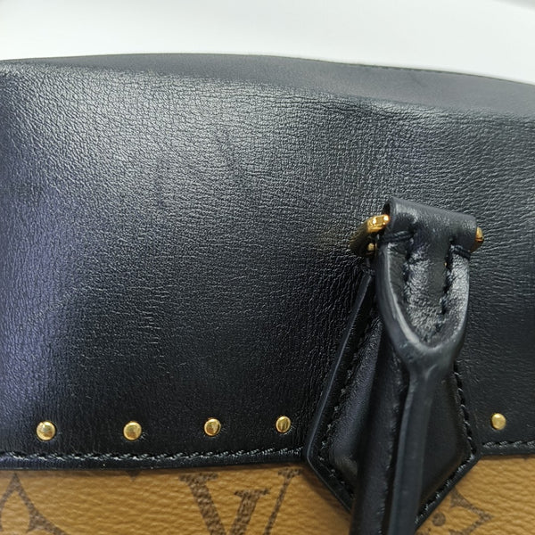 PETITE MALLE Monogram Coated Canvas Brown
