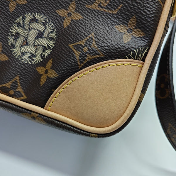 AMAZON Monogram Coated Canvas Brown
