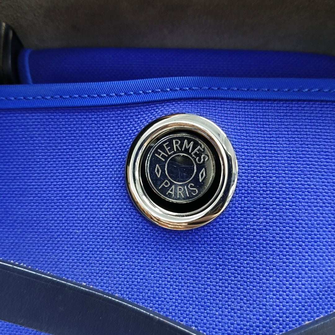 Authenticated pre-owned  Herbag 31 Canvas Blue - Shoulder Bag at Looply