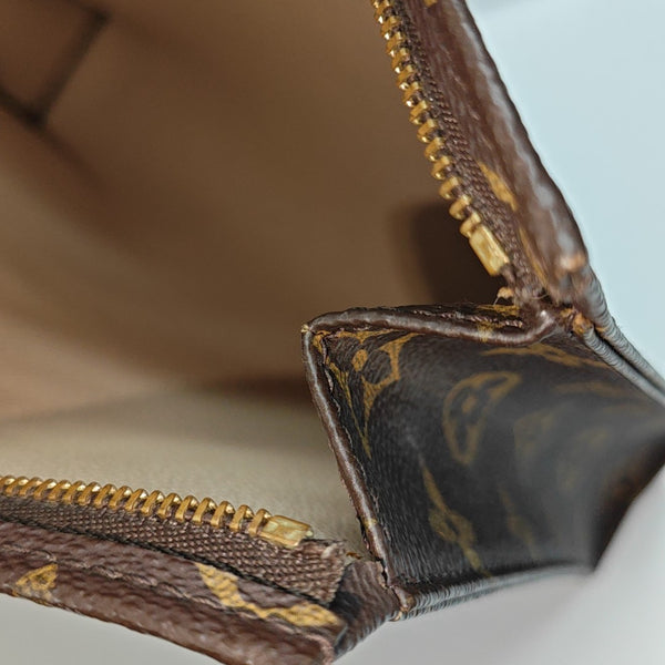 TOILET POCKET 26 Monogram Coated Canvas Brown