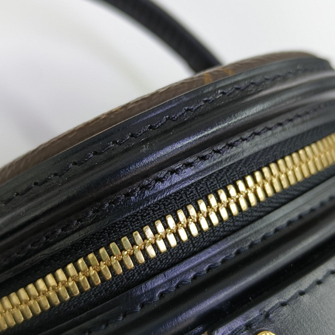 CANNES PM Monogram Coated Canvas Brown