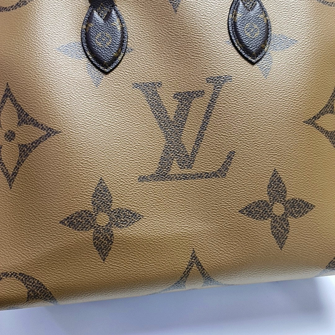 ONTHEGO MM Monogram Coated Canvas Brown