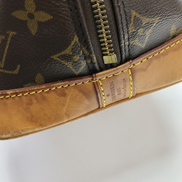 ALMA PM Monogram Coated Canvas Brown