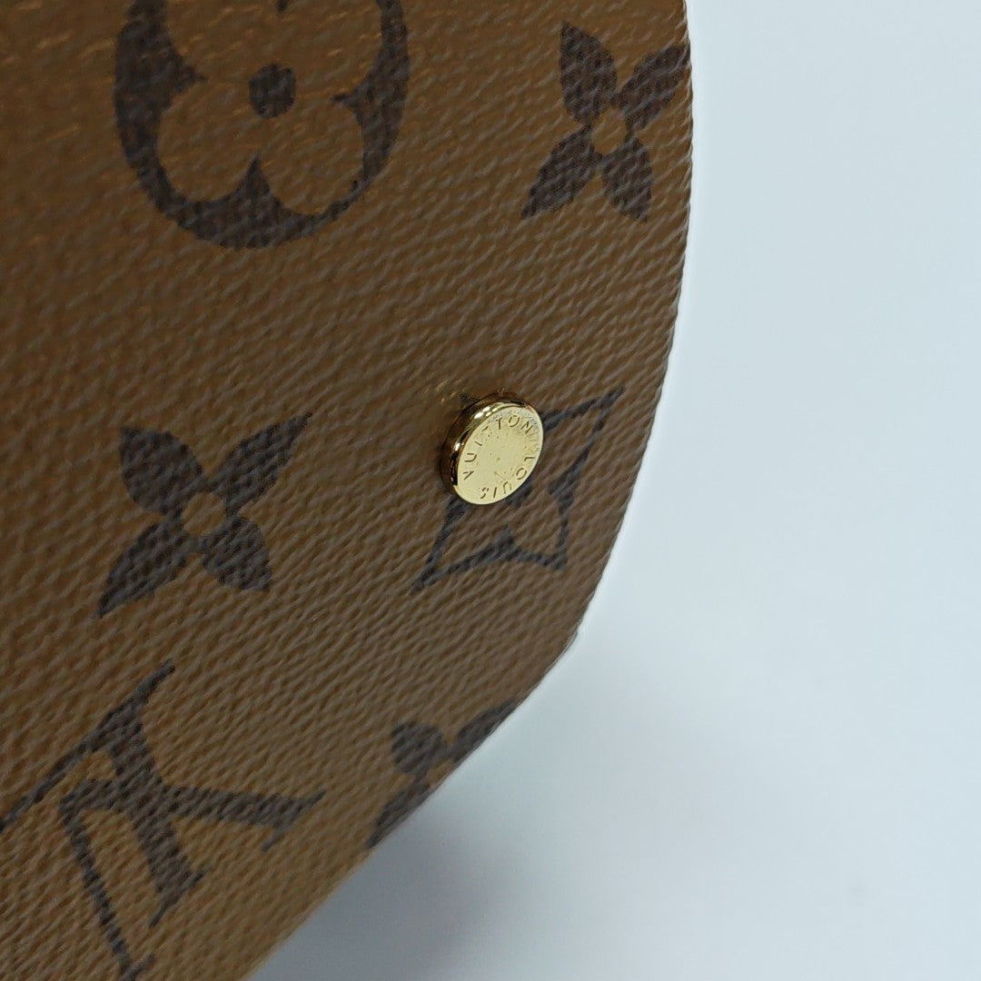 CANNES PM Monogram Coated Canvas Brown