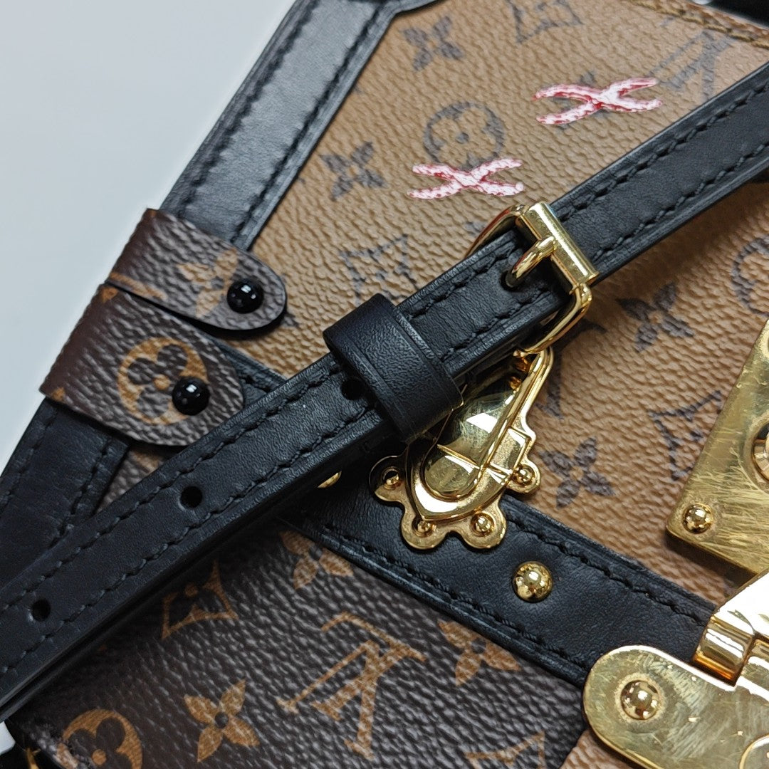 TRUNK Monogram Coated Canvas Brown