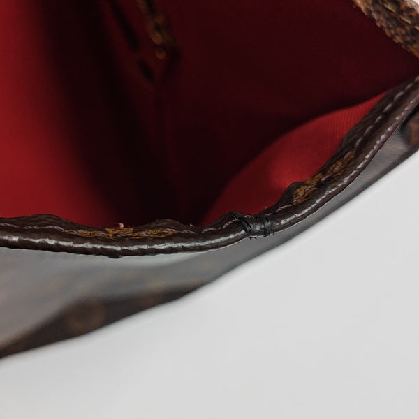 ONTHEGO MM Monogram Coated Canvas Brown