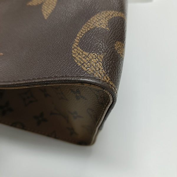 ONTHEGO MM Monogram Coated Canvas Brown
