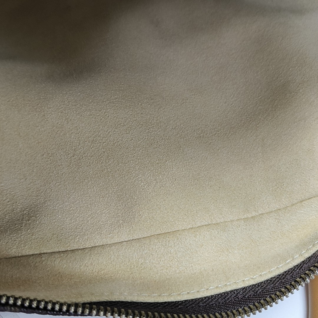MANHATTAN GM Monogram Coated Canvas Brown