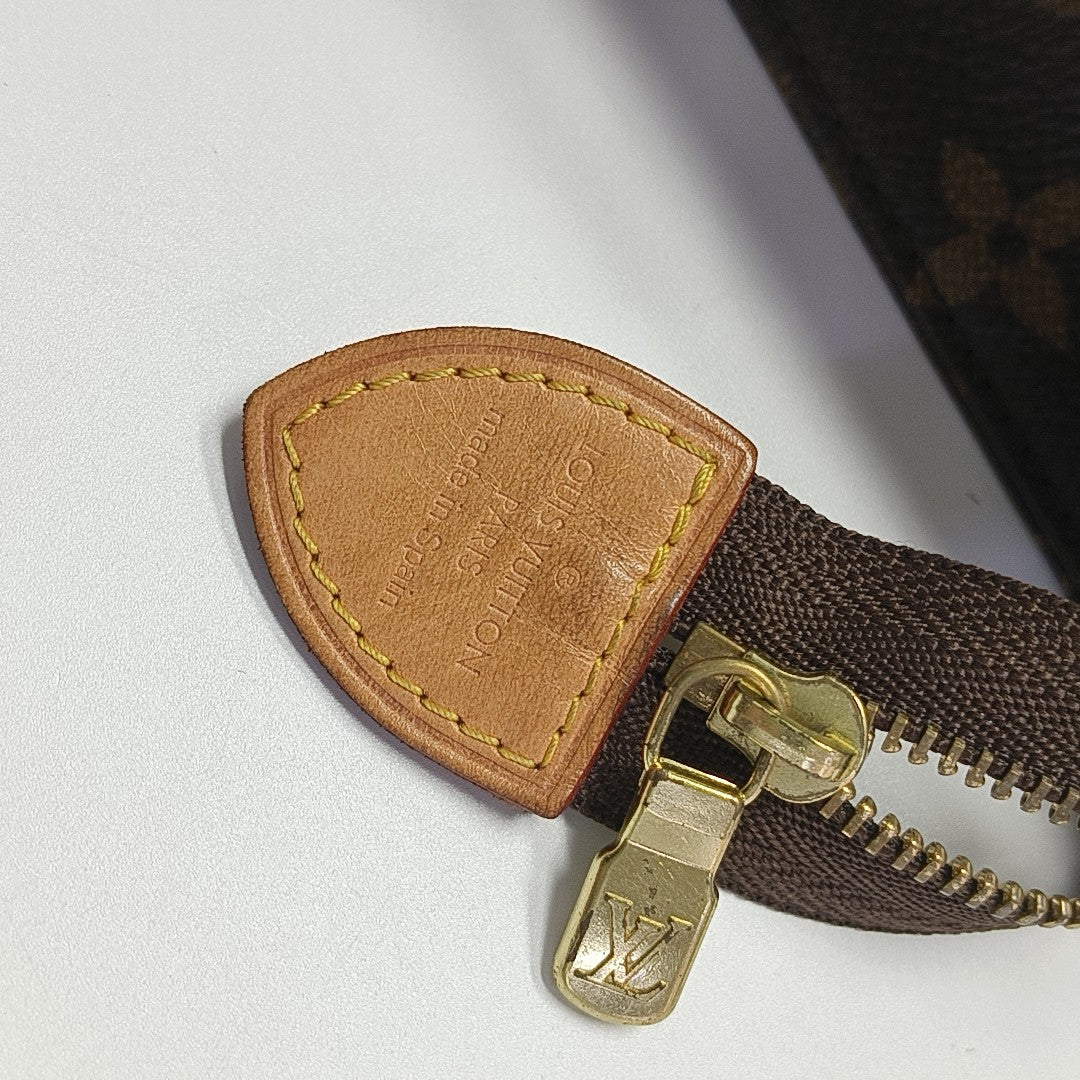 TOILET POCKET 26 Monogram Coated Canvas Brown