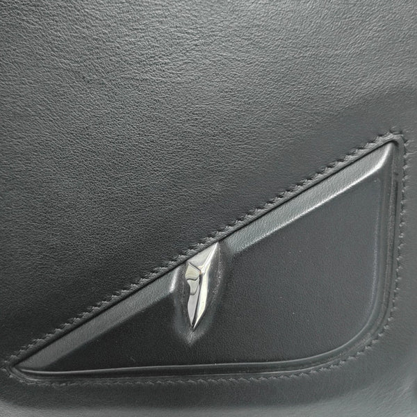 Authenticated pre-owned  Monster Calfskin Black - Clutch at Looply