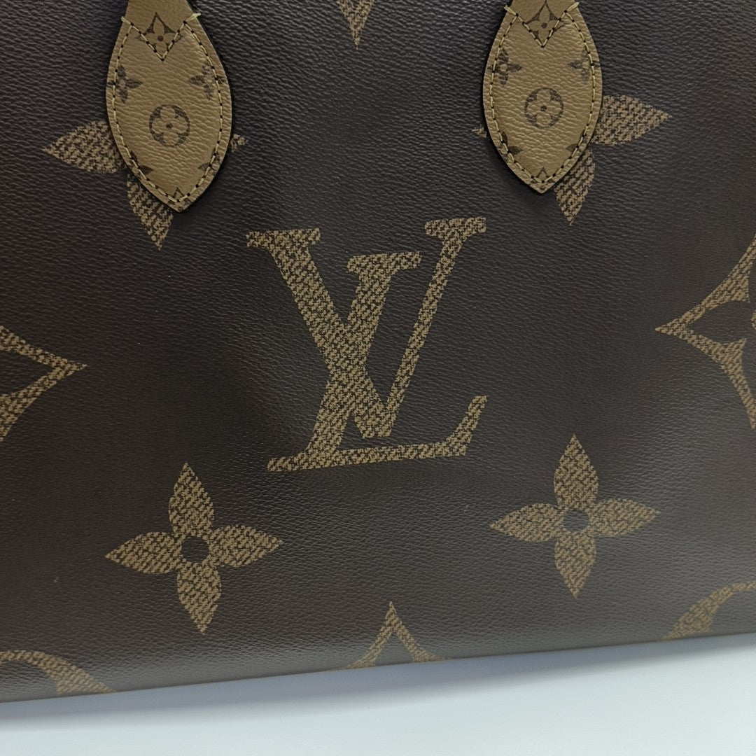 ONTHEGO MM Monogram Coated Canvas Brown
