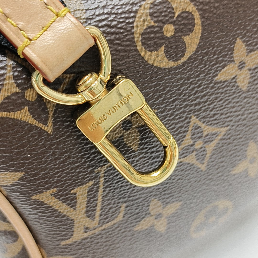 SPEEDY 20 Monogram Coated Canvas Brown
