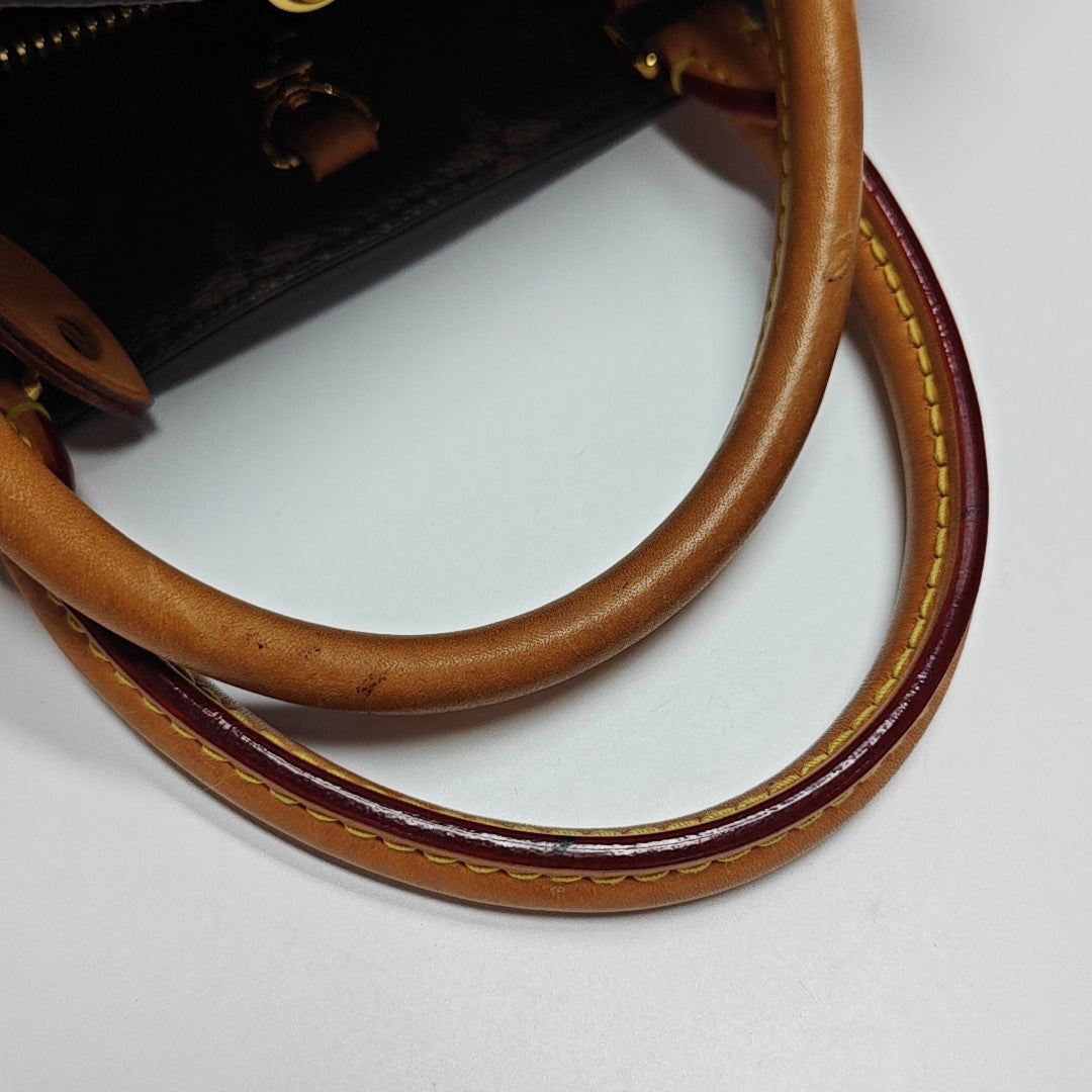 MONTAIGNE Monogram Coated Canvas Brown