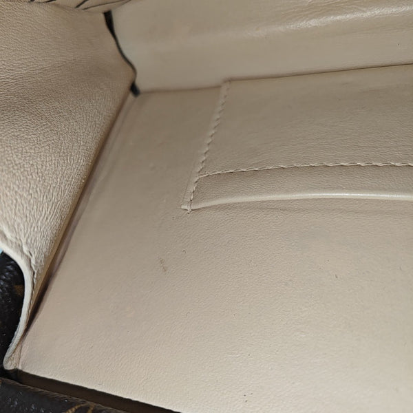 PETITE MALLE Monogram Coated Canvas Brown