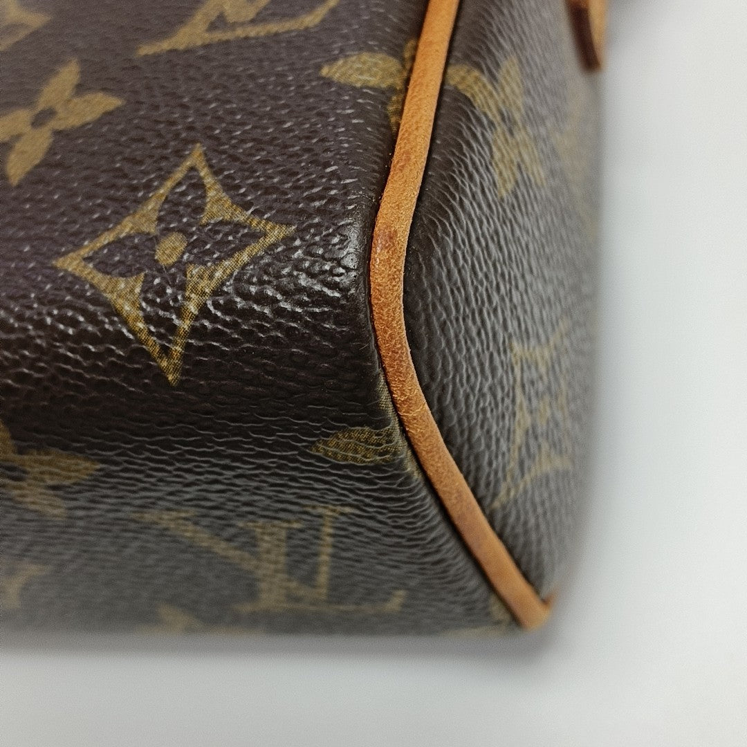 RECITAL Monogram Coated Canvas Brown