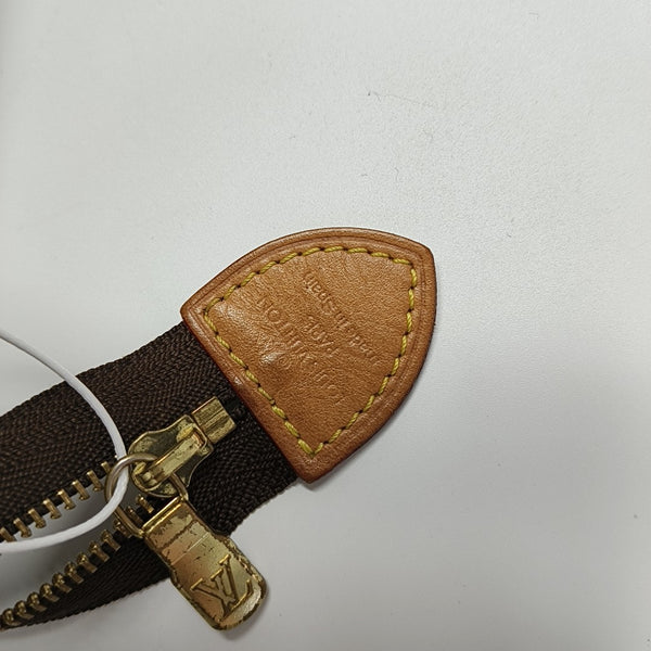 TOILET POCKET 19 Monogram Coated Canvas Brown