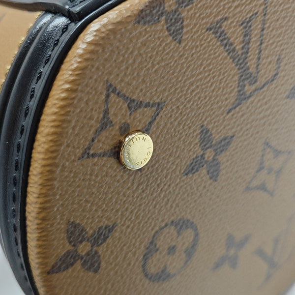 CANNES PM Monogram Coated Canvas Brown