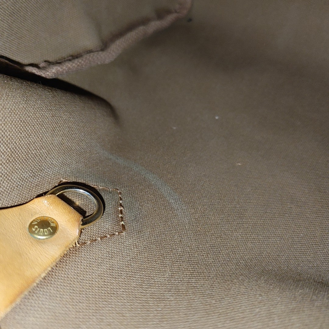 SPEEDY 25 Monogram Coated Canvas Brown