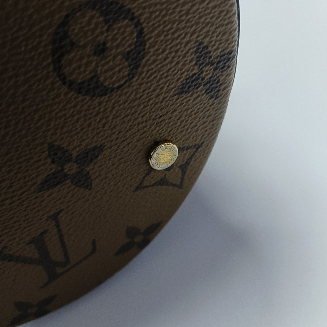 CANNES PM Monogram Coated Canvas Brown