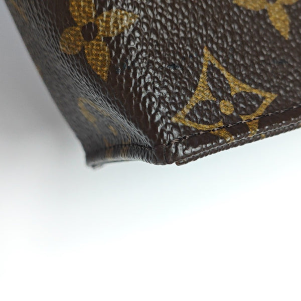 TOILET POCKET Monogram Coated Canvas Brown