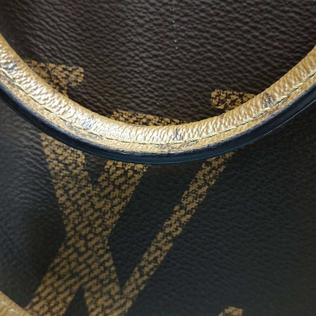ONTHEGO GM Monogram Coated Canvas Brown