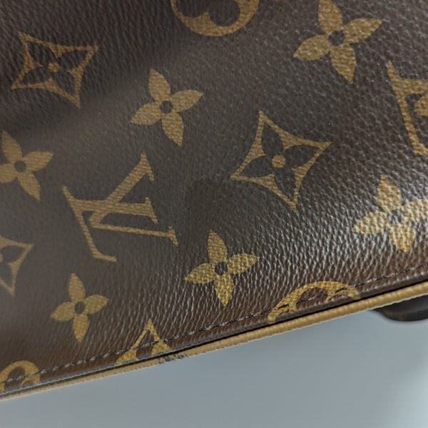 ONTHEGO MM Monogram Coated Canvas Brown