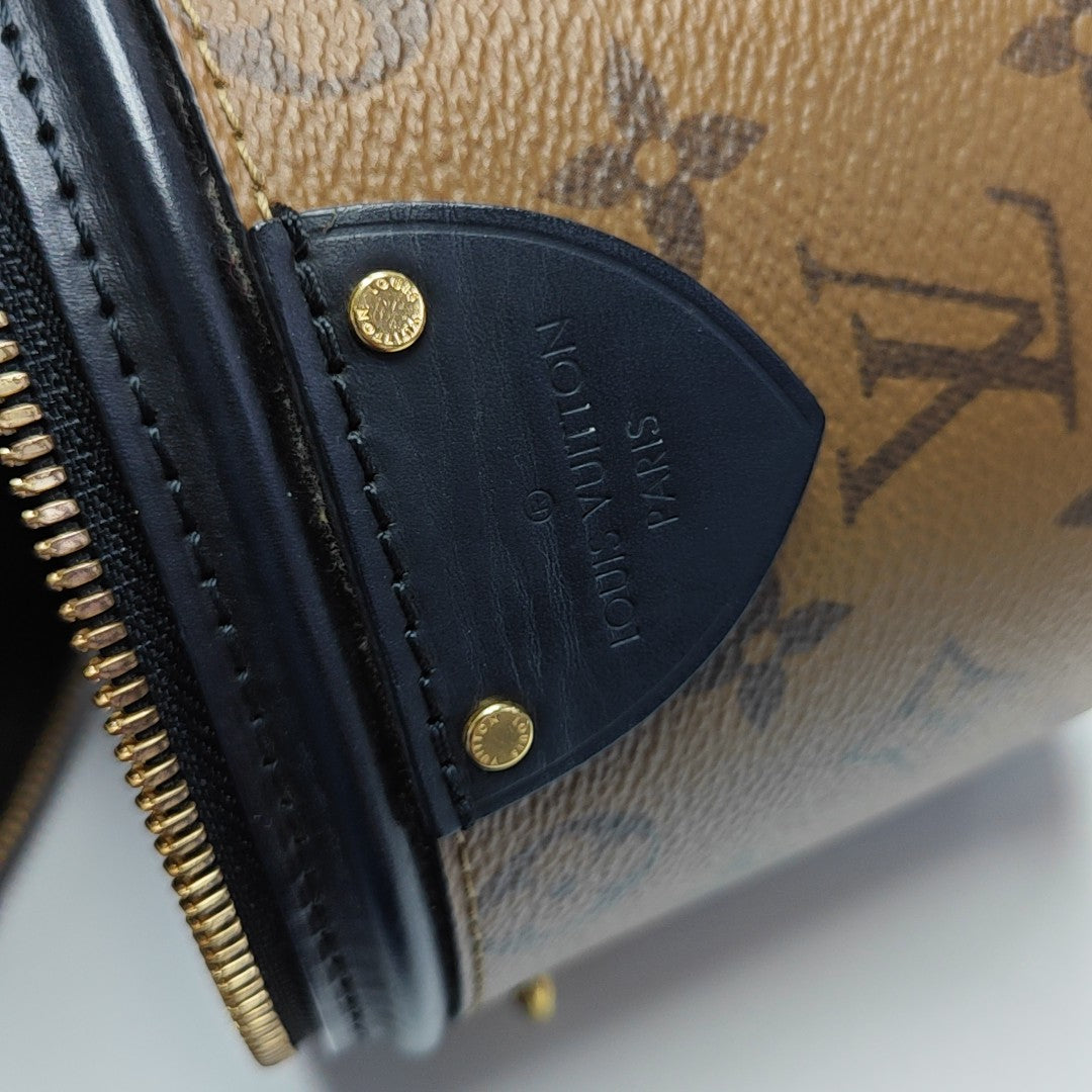 CANNES PM Monogram Coated Canvas Brown