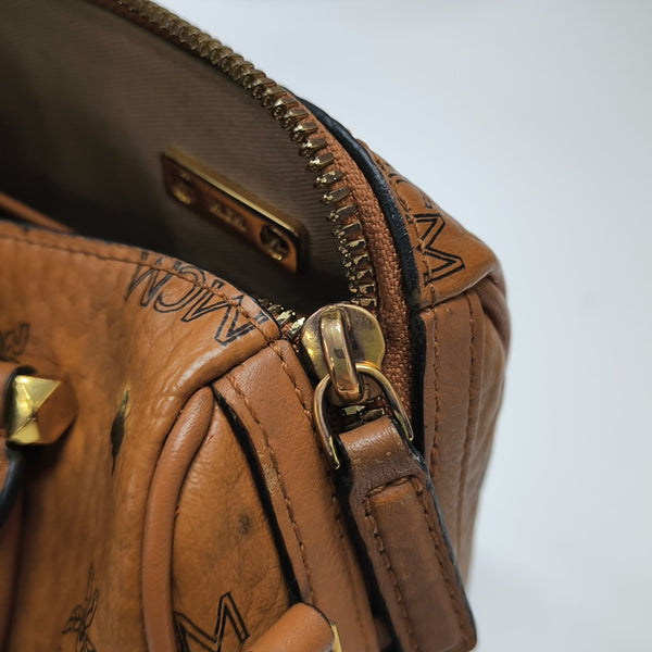 ESSENTIAL Monogram Coated Canvas Brown