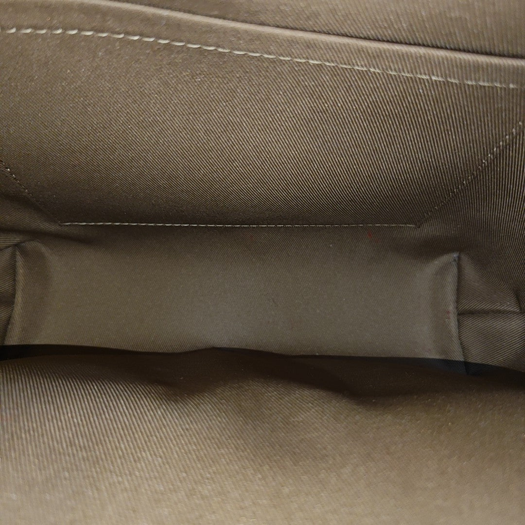 EXCURSION PM Monogram Coated Canvas Brown
