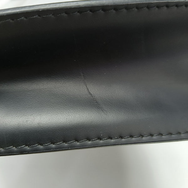 Pochette Voyag MM Monogram Coated Canvas Black