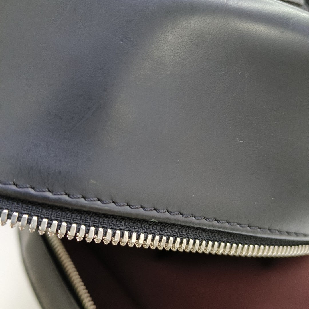 JOSH Monogram Coated Canvas Brown