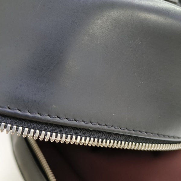 JOSH Monogram Coated Canvas Brown