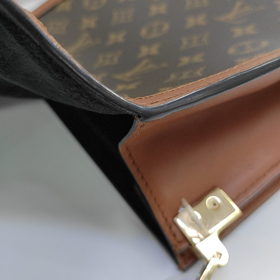 DAUPHINE MM Monogram Coated Canvas Brown