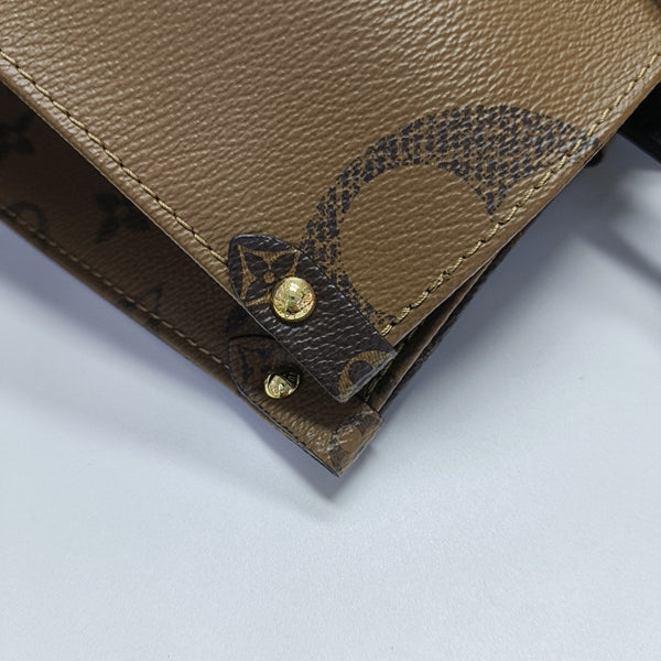 ONTHEGO MM Monogram Coated Canvas Brown