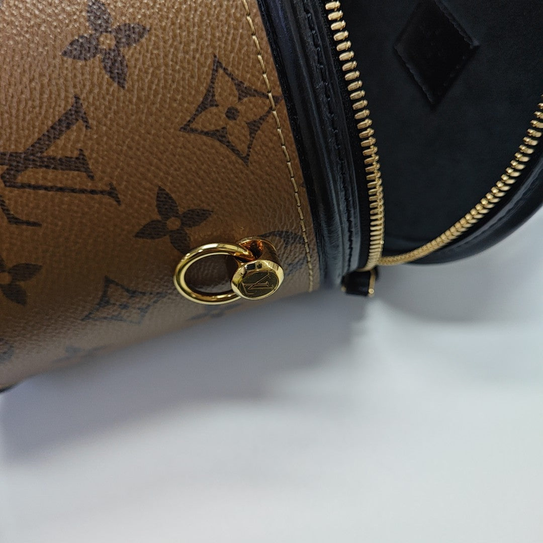 CANNES PM Monogram Coated Canvas Brown