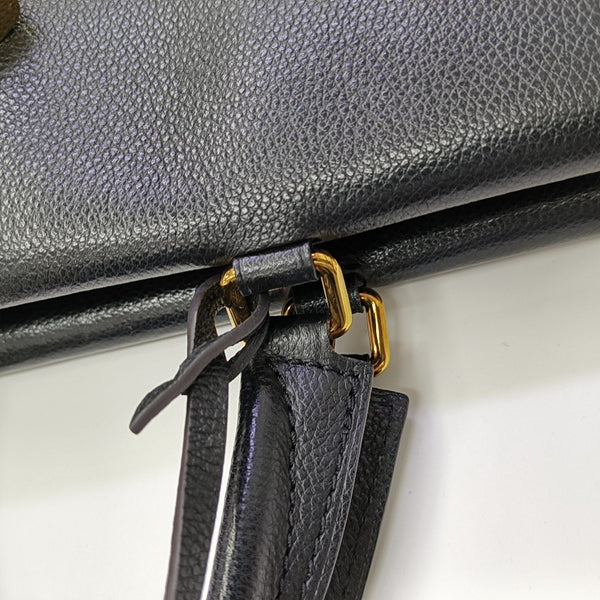 VÉNUS Monogram Coated Canvas Brown