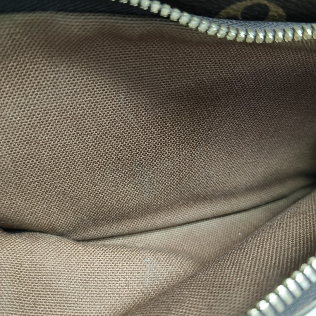 RUSH Monogram Coated Canvas Brown