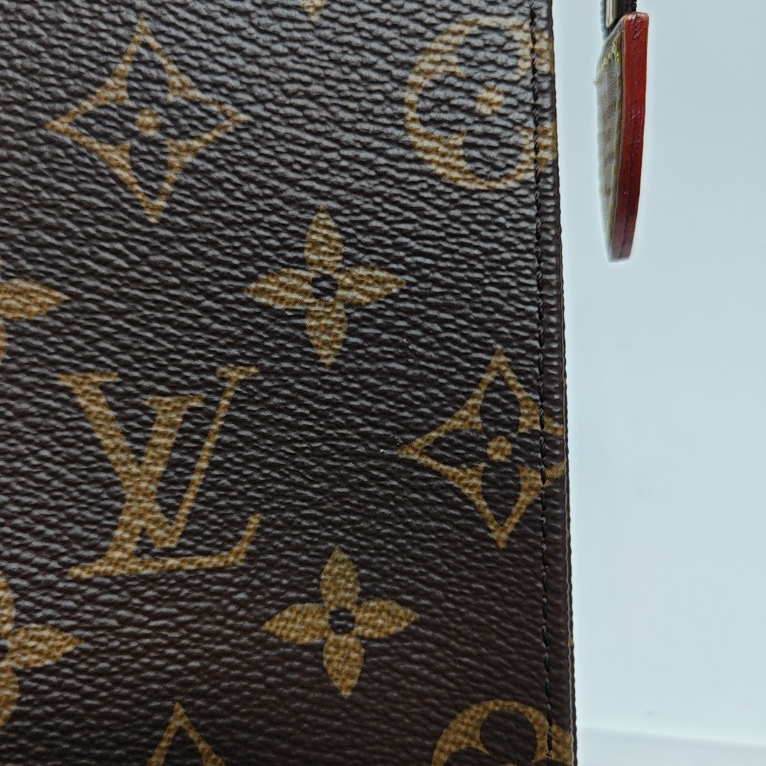 TOILET POCKET 26 Monogram Coated Canvas Brown