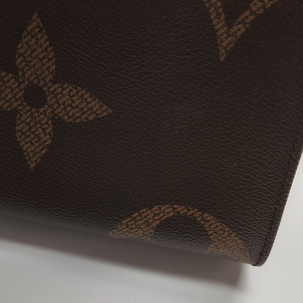 ONTHEGO MM Monogram Coated Canvas Brown