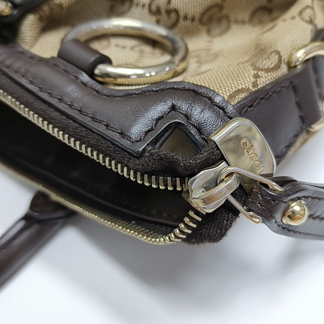 Sukey Monogram Canvas Brown