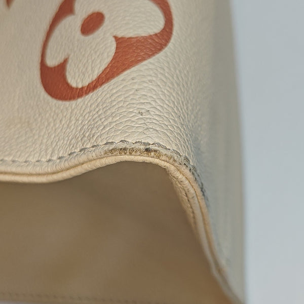 ONTHEGO MM Monogram Calfskin Beige