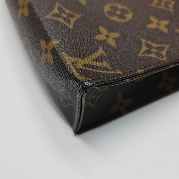 TOILET POCKET 19 Monogram Coated Canvas Brown