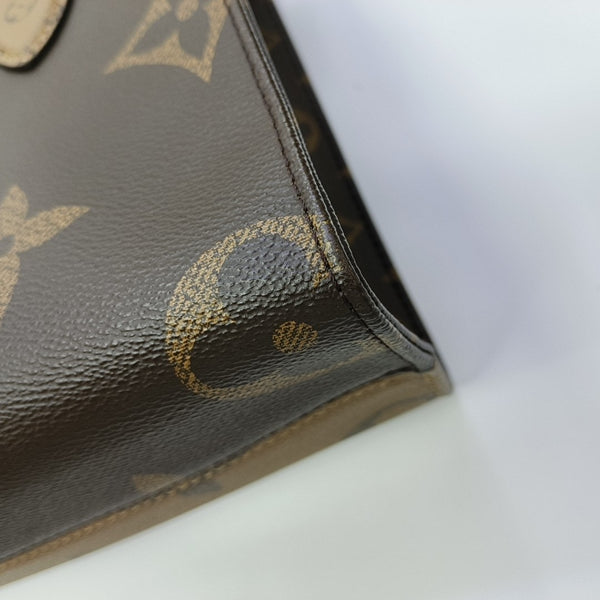 ONTHEGO PM Monogram Coated Canvas Brown