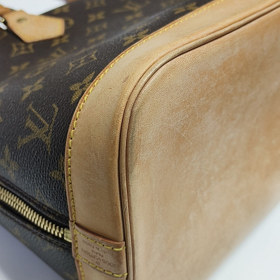 ALMA PM Monogram Coated Canvas Brown