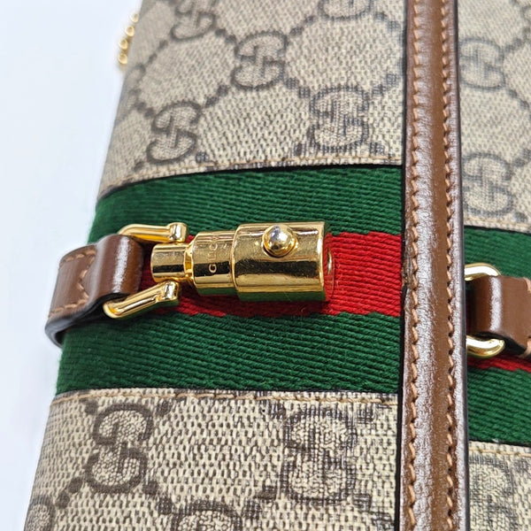 Authenticated pre-owned  Jackie 1961 Monogram Coated Canvas Beige - Shoulder Bag at Looply