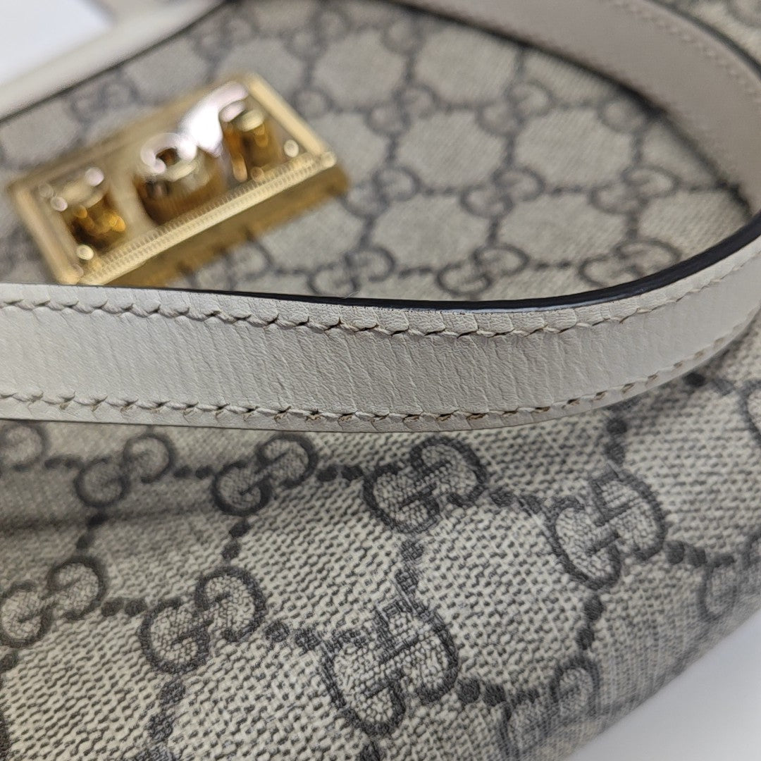 Padlock Small Monogram Coated Canvas Beige