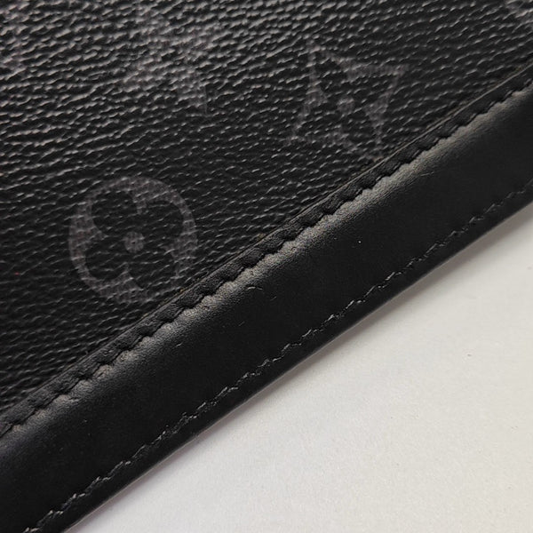 Pochette Voyag MM Monogram Coated Canvas Black