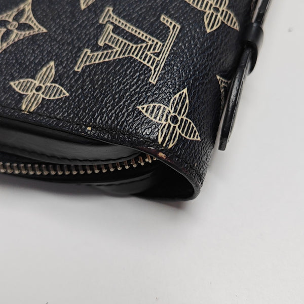 TROUSSE TOILETTE Monogram Coated Canvas Blue